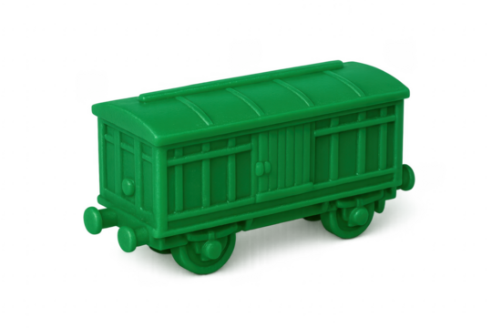 Green plastic toy train wagon playing childhood concept
