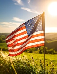 American flag waving in a field at sunset