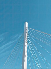 Fototapeta premium Abstract view of a cable-stayed bridge's pylon and cables against a vibrant blue sky