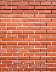 Obraz premium Close-up view of a red brick wall