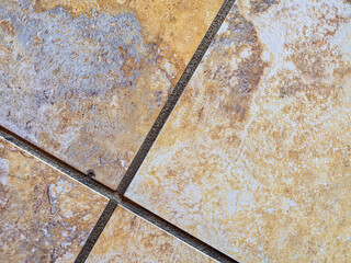 Close view of intersections of kitchen floor tiles