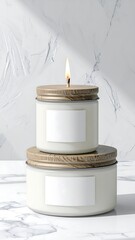 Two candles on a marble surface