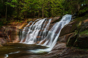 Close-Up of Flowing Water and Rocks at Mumlava Waterfall