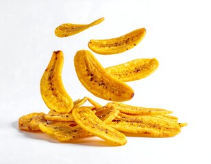 Crispy, golden banana chips in mid-air,  scattered on a white background