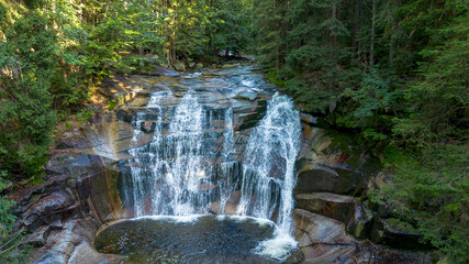 Mountain River Flowing Through Rocks at Mumlava Waterfall