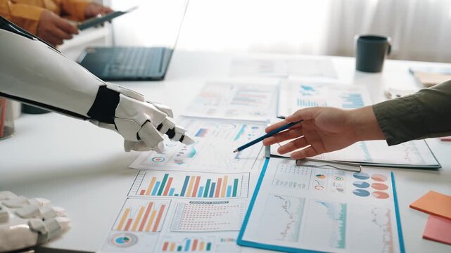 Business consultants working alongside AI-powered solutions to assess financial health and improve decision-making. Noogenesis AI