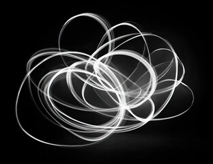 Abstract light trails on black background