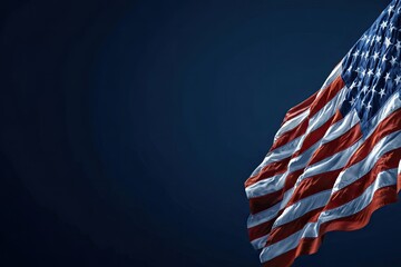 American flag waving in dark background