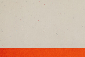 speckled gray and orange hardcover book 