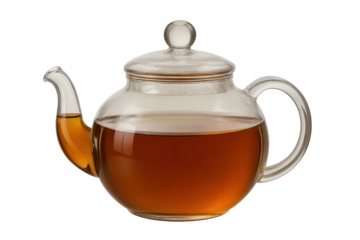 Glass teapot holding hot black tea on transparent background