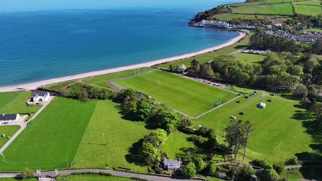 Aerial Drone View of Robert Emmets GAC Cushendun Hurling Pitch Cushendun Village Co Antrim Northern Ireland