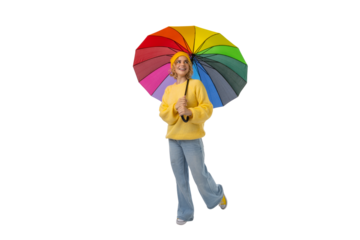 Smiling person with rainbow umbrella walks, isolated on white, PNG