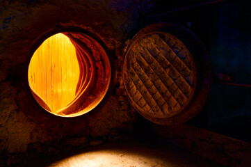 Intense flame combustion in operating steam boiler furnace of thermal power plant reveals heat exchange surfaces