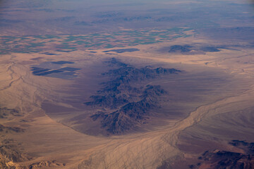 Aerial view of California Mountains,  view from  airplane window.