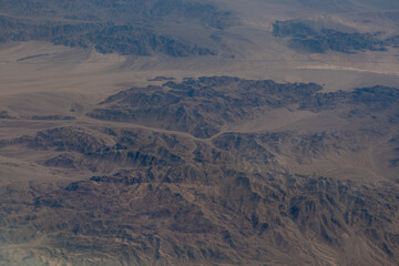 Aerial view of California Mountains,  view from  airplane window.