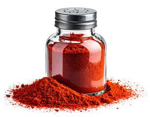 Clear glass spice jar filled with red powder, sits atop a pile of the same powder