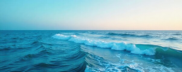 Vast, unbroken expanse of the ocean's surface, calm waves gently rolling under a clear sky Perfect for travel, nature, and serenity themes , serenity, sky, peaceful