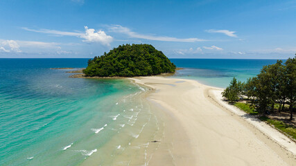 Seascape: Beautiful beach and tropical island. Kelambu Beach. Borneo, Malaysia.