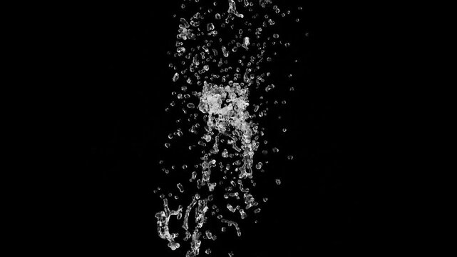 super slow motion water drop collider on black bg