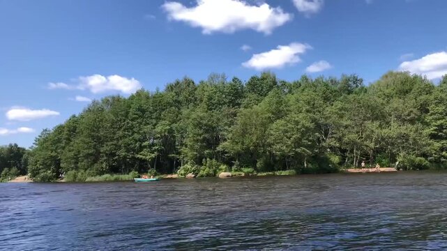summer river landscape with a rowboat, time lapse