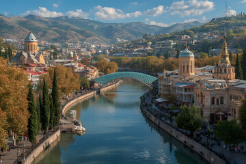 Obraz premium View on the Bridge of Peace over Kura river in the city center of Tbilisi, Georgia
