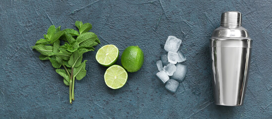 Shaker and ingredients for mojito on blue background