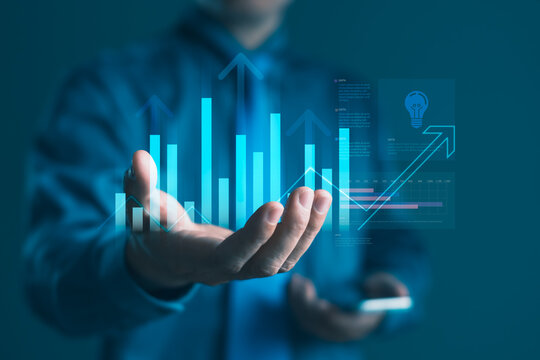 Businessman showing data analytics and financial growth graph for success strategy