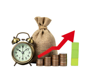 Vintage alarm clock, money bag, and rising graph depicting financial growth