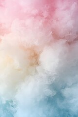 Naklejka premium Colorful pastel cotton candy cloud texture in pink, cream and blue shades, creating dreamy fluffy abstract background for sweet design, fantasy atmosphere and creative wallpaper concept