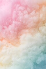 Colorful pastel cotton candy cloud texture in pink, cream and blue shades, creating dreamy fluffy abstract background for sweet design, fantasy atmosphere and creative wallpaper concept