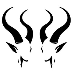 Silhouette of a pair of mysterious demon heads