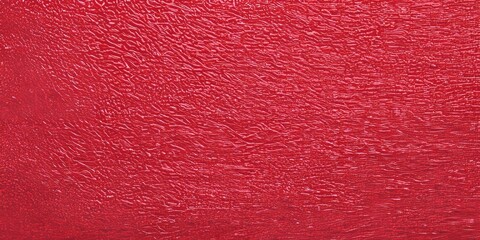 Red textured paper surface with vintage paint pattern background