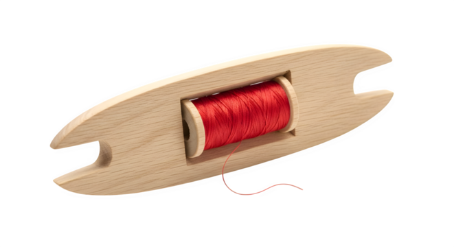 Closeup of a vintage wooden weaving shuttle with red thread isolated on transparent background, a tool used in traditional textile production