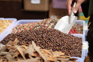 Vibrant spices at a bustling market stall