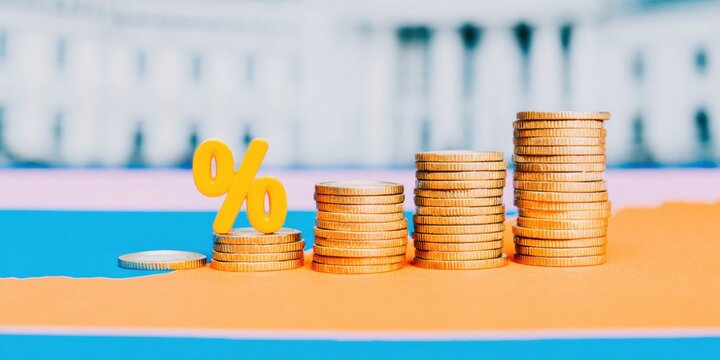 Professional Investment Growth Concept with Gold Coin Stacks and Percentage Sign Modern Financial Platform Content for Confident Millennials