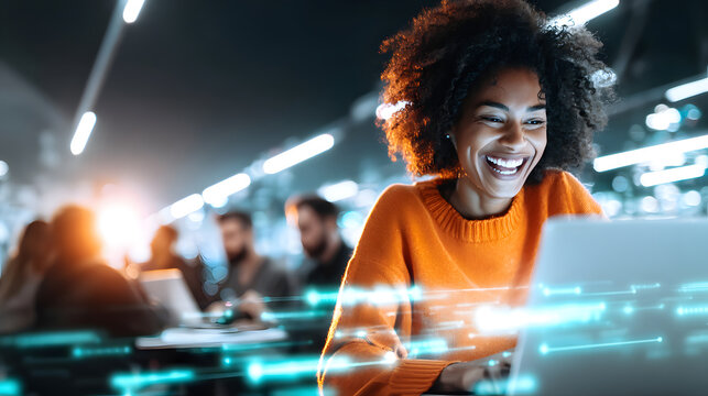 Smiling woman orange sweater laptop coworking modern office night technology neon light teamwork innovation blend in vibrant workspace mood