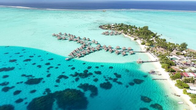 Drone Shot of Bora Bora Island, Luxury Resort With Overwater Bungalows, Lagoon in Shades of Blue, French Polynesia
