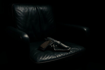 gun on leather chair