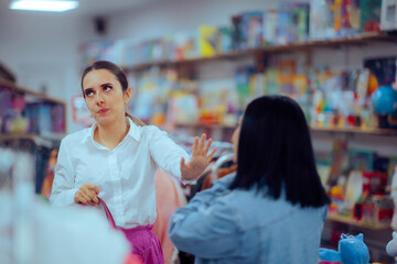 Woman Fighting in a Store Being Rude Making a Scene. Clients arguing in a boutique making defensive...