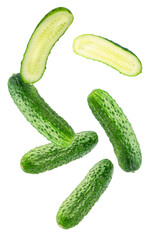cucumbers and cucumber slices against a black backdrop for healthy living