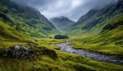 Misty valley, verdant hills, rugged mountains