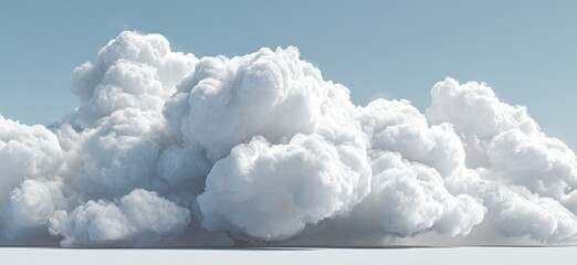 Fluffy white cumulus clouds against a light blue sky