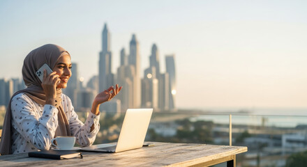 Smiling muslim woman on video call with city skyline