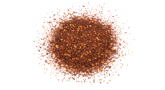 Close up macro shot of shimmering copper and gold glitter dust particles scattered on a black background