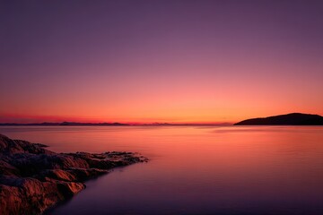 Obraz premium Serene sunset over a calm lake