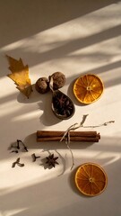 Autumnal spice arrangement, sunlit flat lay