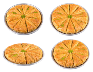 Overhead View of Four Knafeh Dishes Isolated on Transparent Background Displaying Golden Baked Pastry Sections with Green Garnish