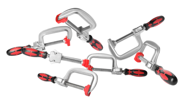 steel c clamps arranged for a presentation on black