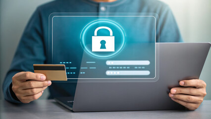 Online protection rights for user with credit card and laptop showing secure digital lock icon