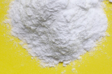 White creatine powder, used as a pre-workout supplement for gym and fitness.